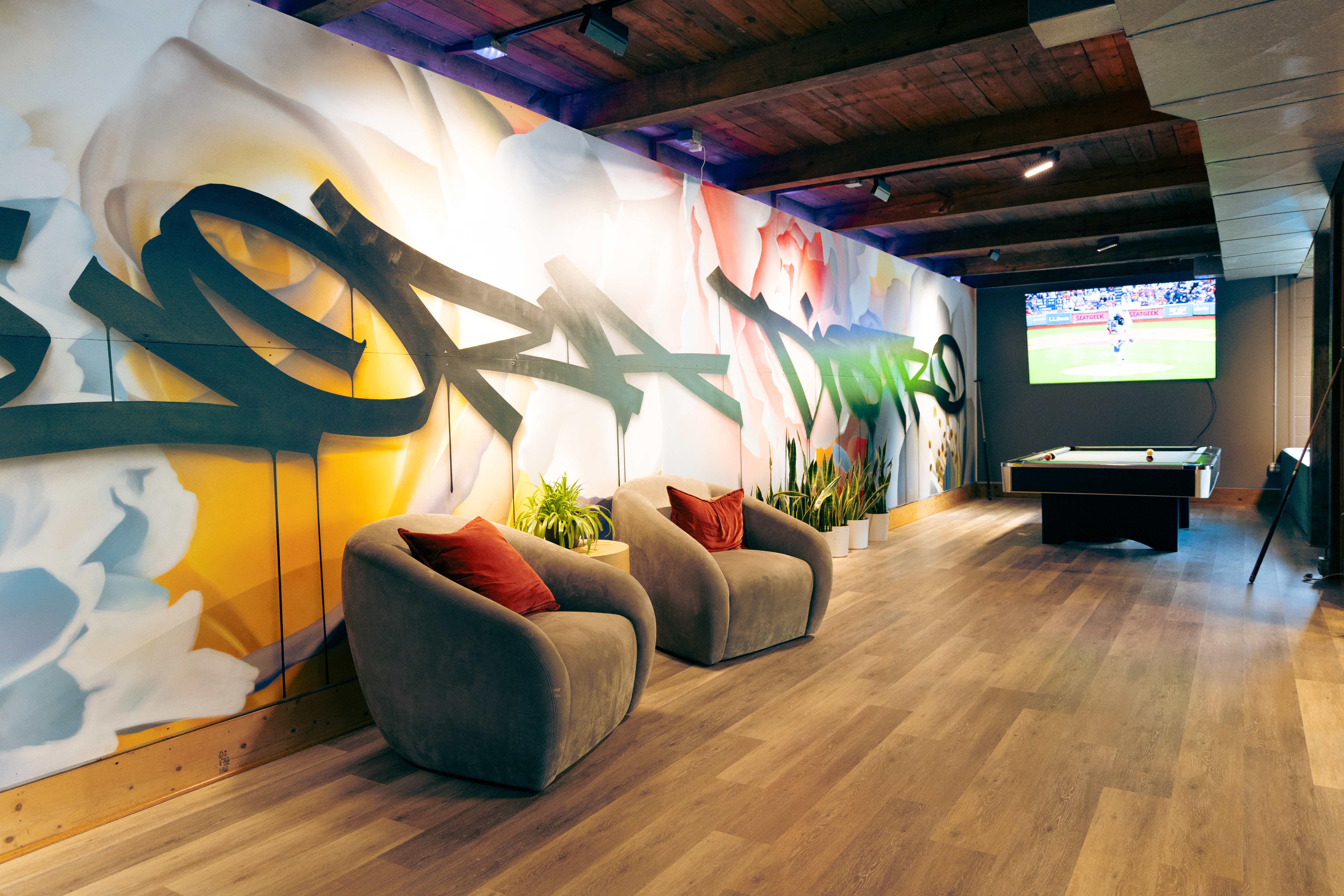 Lounge seating with sports on projector