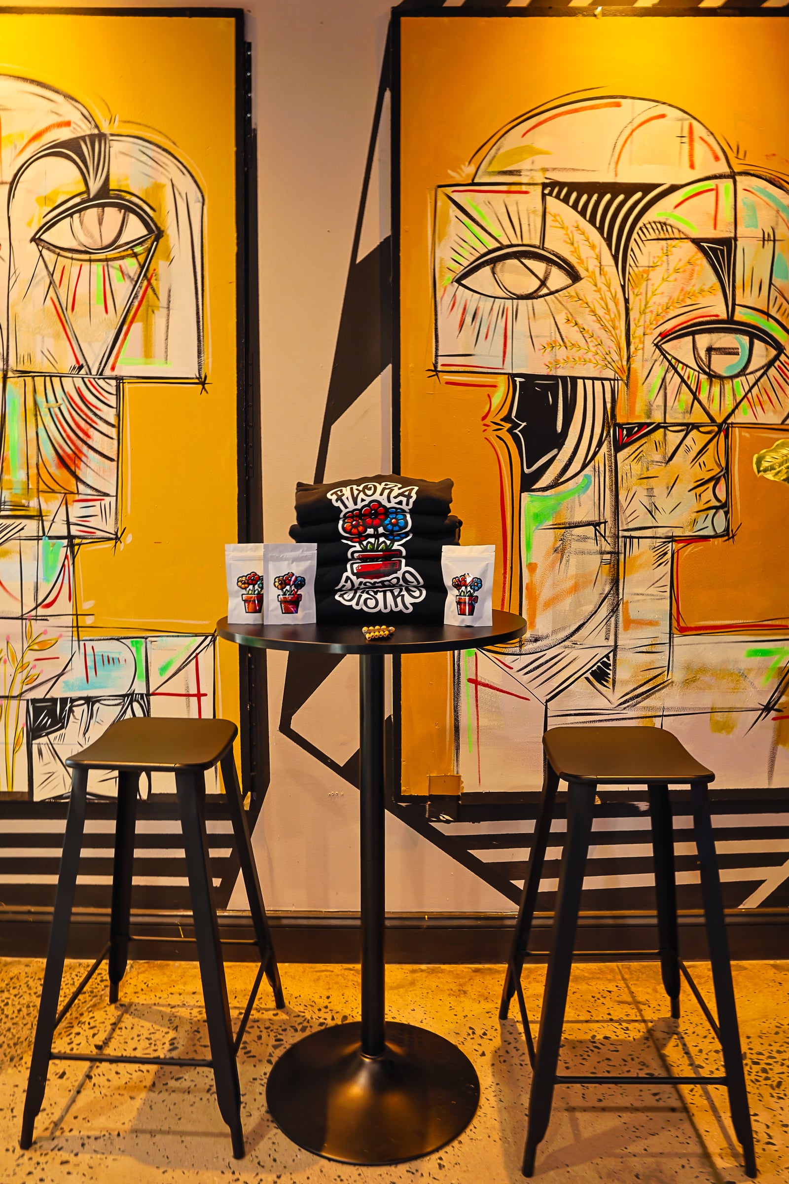Flora merch and yellow murals