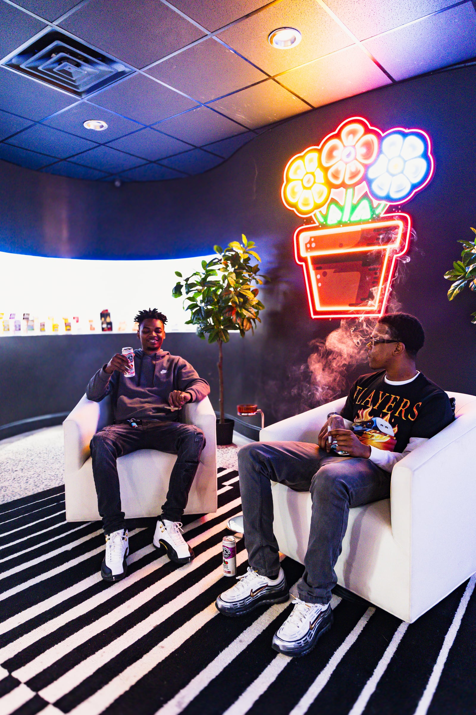 Two men chatting in armchairs
