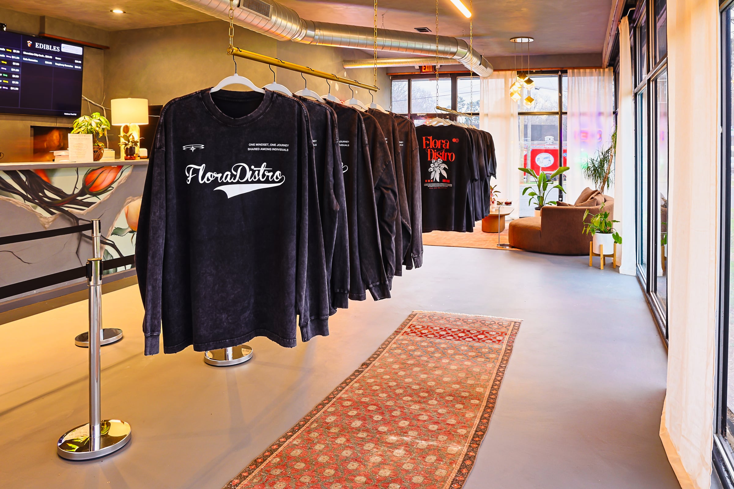 Flora tees on clothing rack