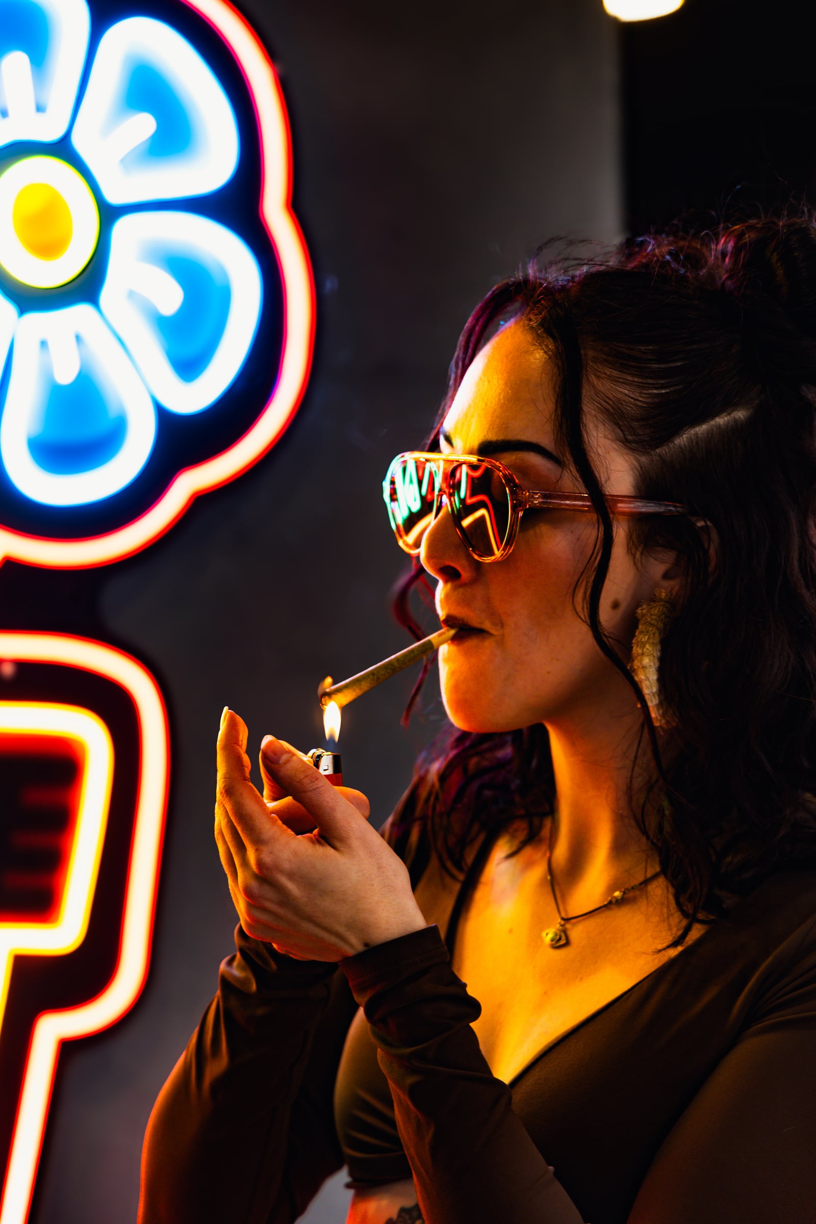 Woman in warm neon light