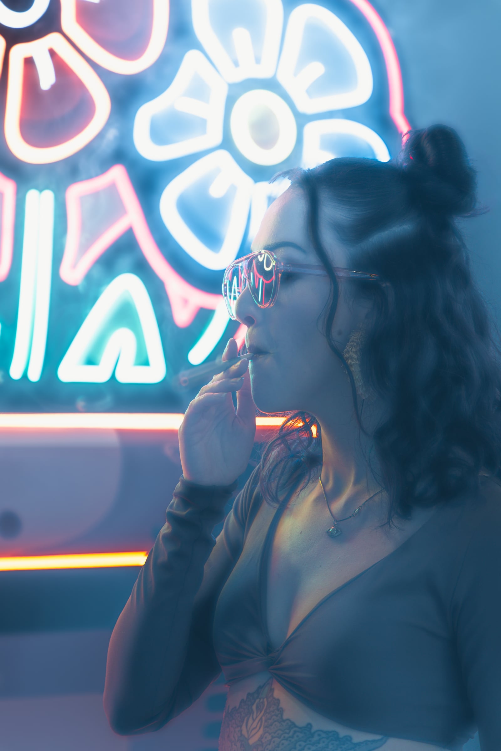 Woman in blue neon glow